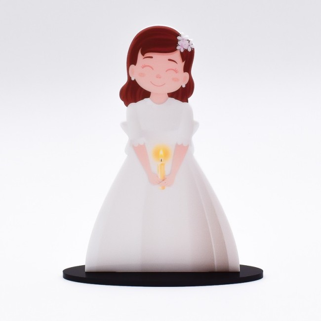 Figura comunión personalizada de niña sujetando una vela