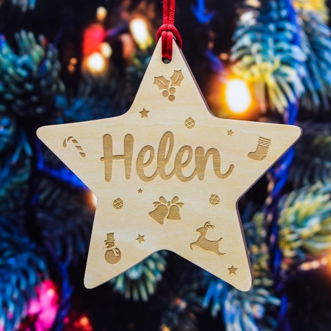 Adorno estrella árbol con decoración navideña