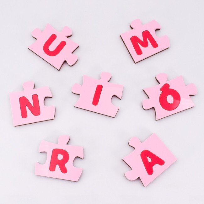 Piezas de puzzle para decoración infantil rosa